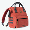 adventurer-red-mini-12l-backpack-three-quarter-view-side-pocket
