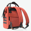 adventurer-red-mini-12l-backpack-back-three-quarter-view-amovibles-straps