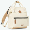 adventurer-cream-mini-12l-backpack-three-quarter-view-side-pocket