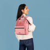 adventurer-pink-mini-12l-backpack-lifestyle